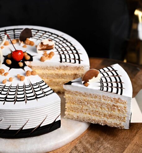 attachment-https://honeycastle.co.in/wp-content/uploads/2025/04/round-shaped-butterscotch-cake-4-cake892butt-DD-458x493.jpg
