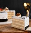 attachment-https://honeycastle.co.in/wp-content/uploads/2025/04/round-shaped-butterscotch-cake-4-cake892butt-EE-100x107.jpg