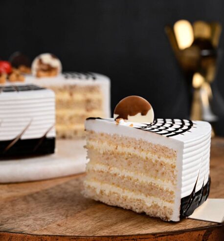 attachment-https://honeycastle.co.in/wp-content/uploads/2025/04/round-shaped-butterscotch-cake-4-cake892butt-EE-458x493.jpg