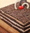 attachment-https://honeycastle.co.in/wp-content/uploads/2025/04/sq-square-shaped-choco-filled-black-forest-cake-cake2278blac-C_4-100x107.jpg