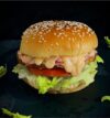 attachment-https://honeycastle.co.in/wp-content/uploads/2025/05/Aloo-tikki-Cheese-burger-1-100x107.jpg