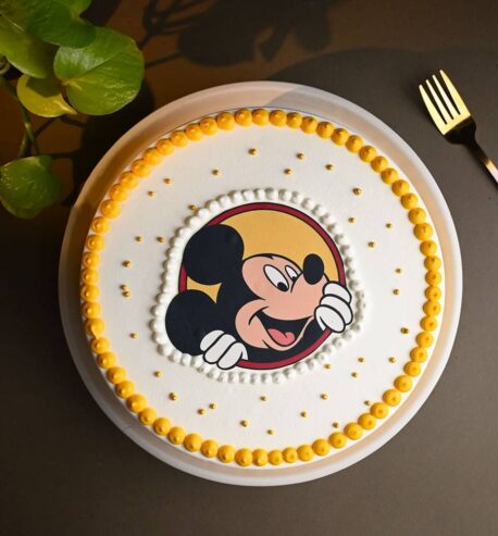 attachment-https://honeycastle.co.in/wp-content/uploads/2025/05/minnie-mouse-cake-with-matching-kids-rakhi-phot4041flav-d-458x493.jpg
